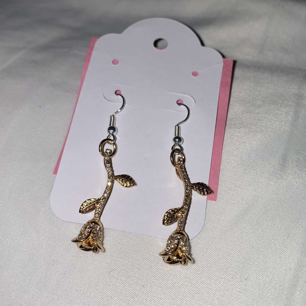 Gold rose dangling earrings